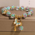 Women's rose garden bracelet with coloured glaze butterfly charm in blue, Japanese Korean style