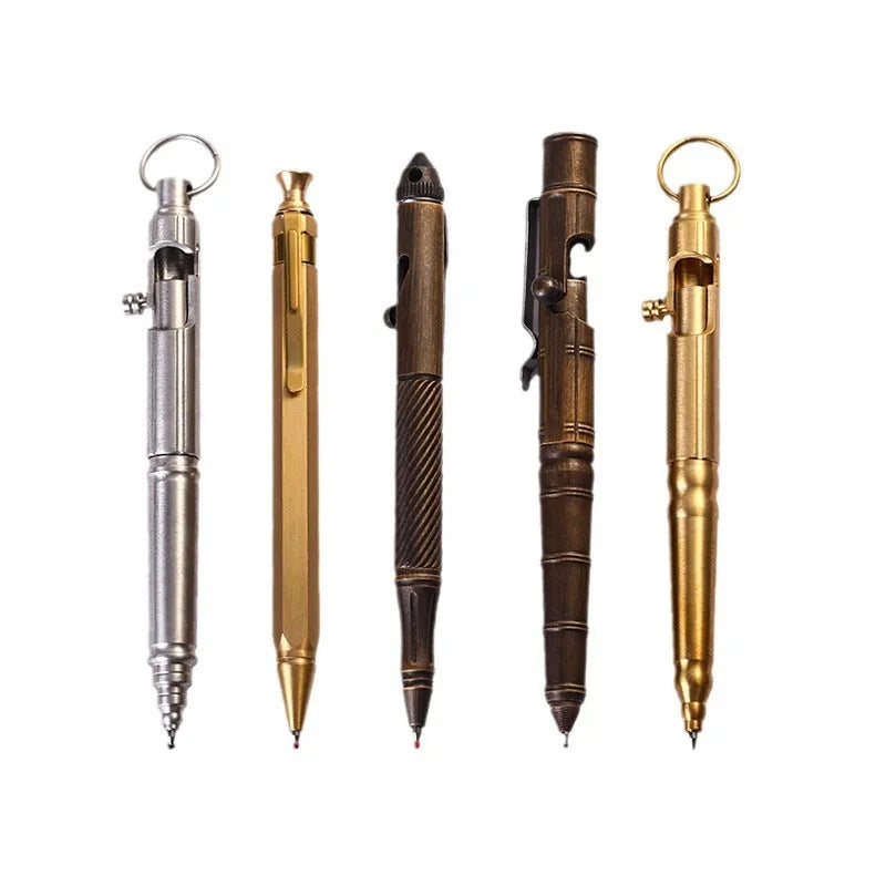 Retro brass tactical pen with cylindrical barrel and six-ring grip, shown with press mechanism extended