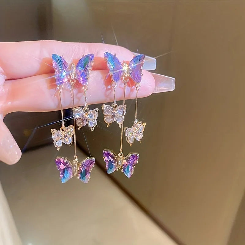 Silver needle electroplated alloy earrings with blue purple butterfly tassel and crystal flower details