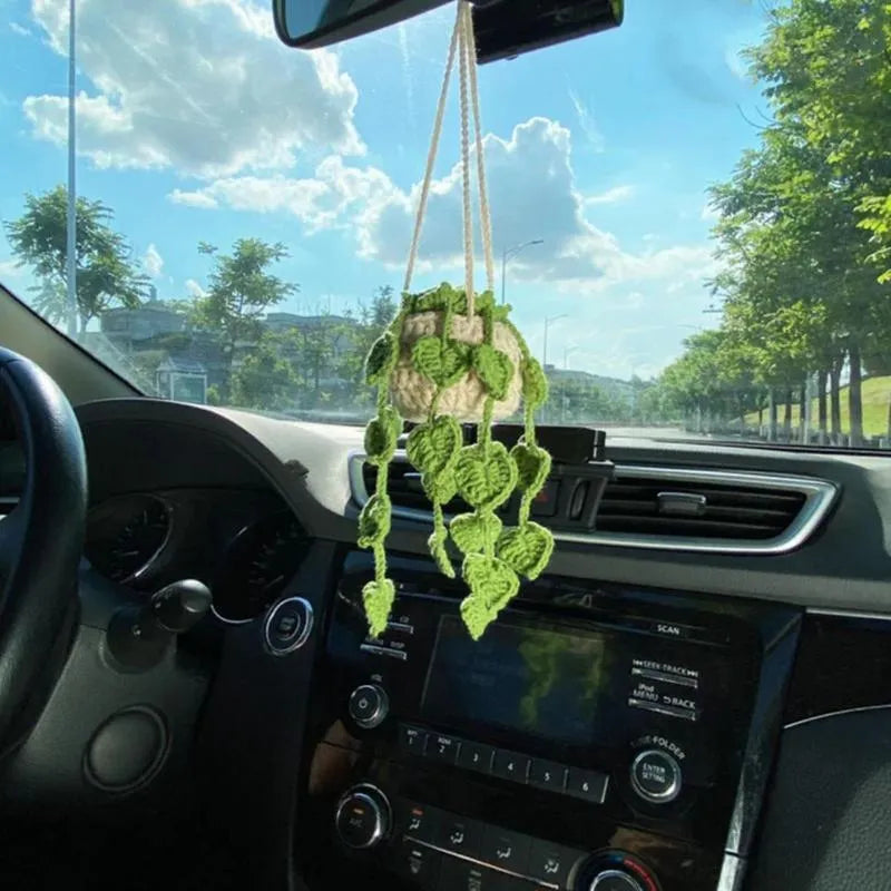 Green and white knitted rope car plant ornament with 8cm base and hanging rope.