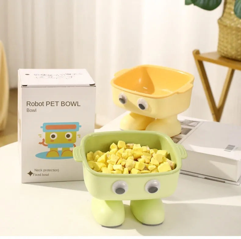 Green robot design elevated pet bowl with tilted feeding surface and detachable inner bowl