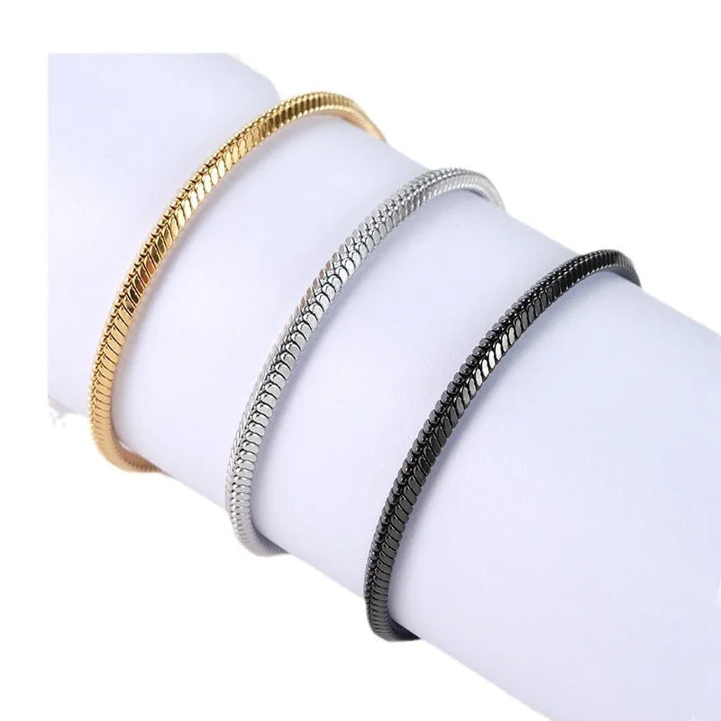 Stainless steel snake chain bracelet in silver tone, geometric line design with electroplated finish