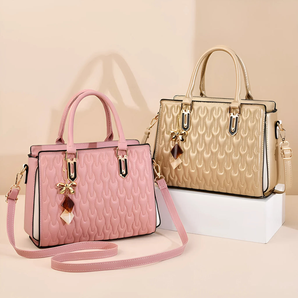 Women's messenger shoulder bag in gold colour showing outer pocket sandwich design and organised interior compartments