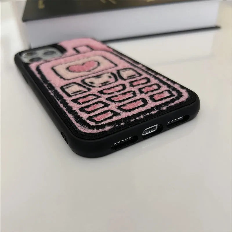 Pink towel embroidered TPU phone case for iPhone showing textured back surface and camera cutouts
