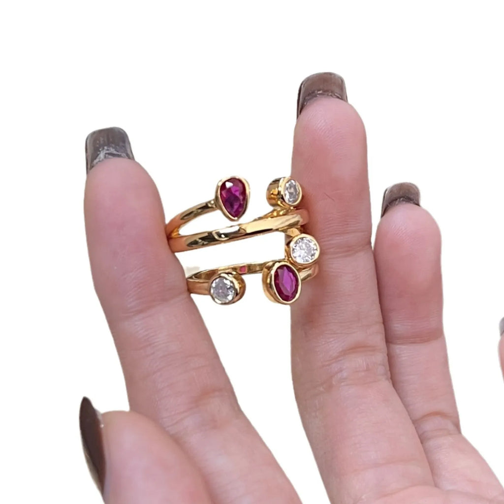 Irregular geometric cross ring with two-tone colour and group diamond setting in retro style