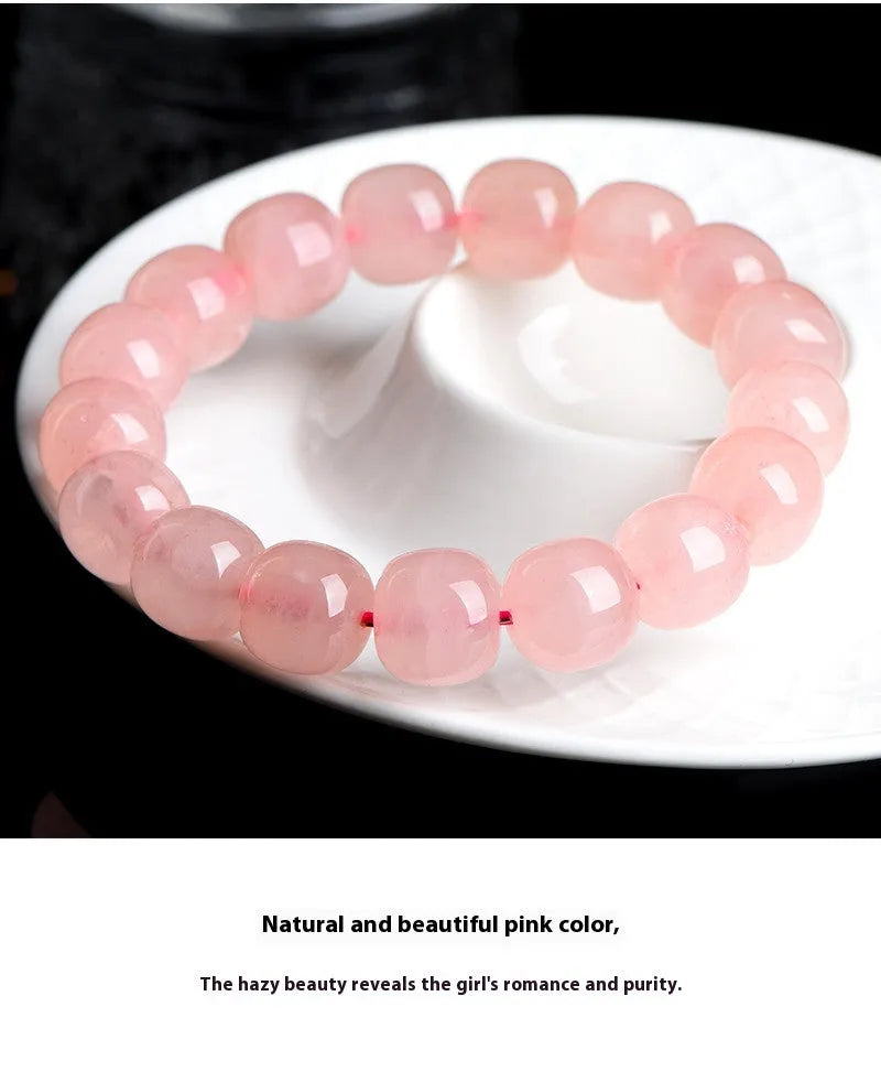 Pink natural crystal barrel bead bracelet with 8x10mm geometric design and polished finish
