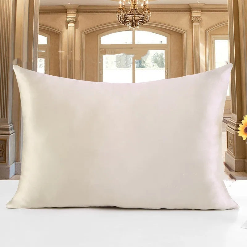 Double-sided 19 M silk pillowcase in apricot colour, showing reversible construction and standard UK size.