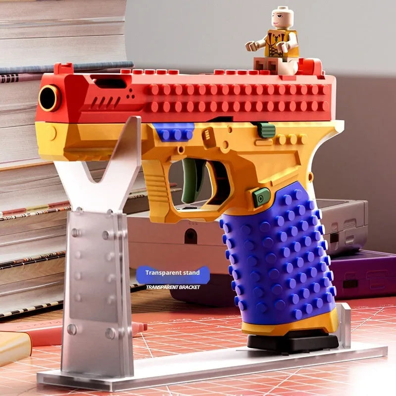 Glock G17 building block assembling gun on transparent stand with bullets and casings