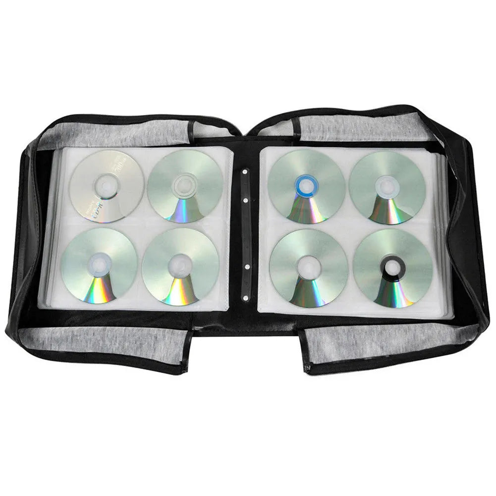 Black Oxford cloth CD and DVD storage binder with zipper and top carry strap.