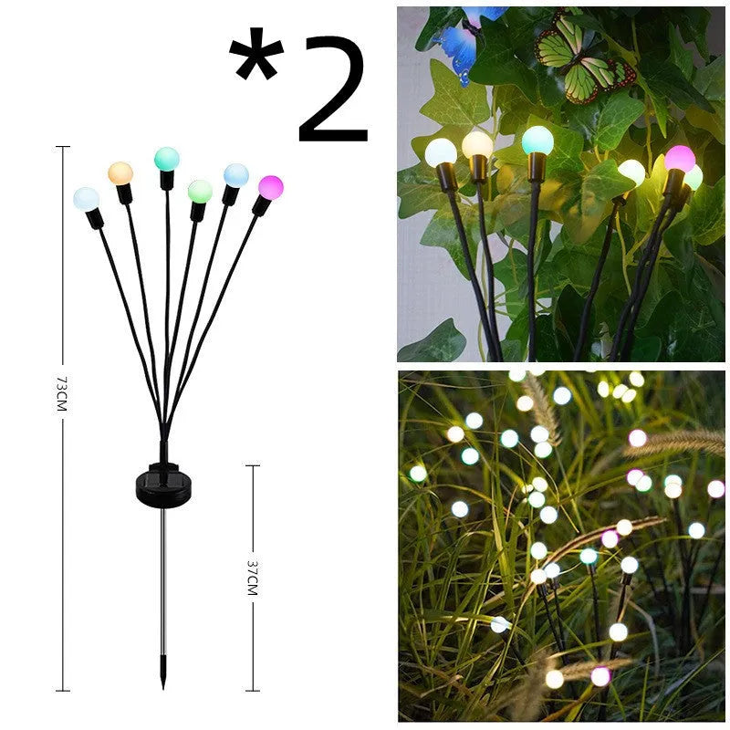 Solar-powered LED garden ground light with multiple light heads and a stainless steel spike for installation.