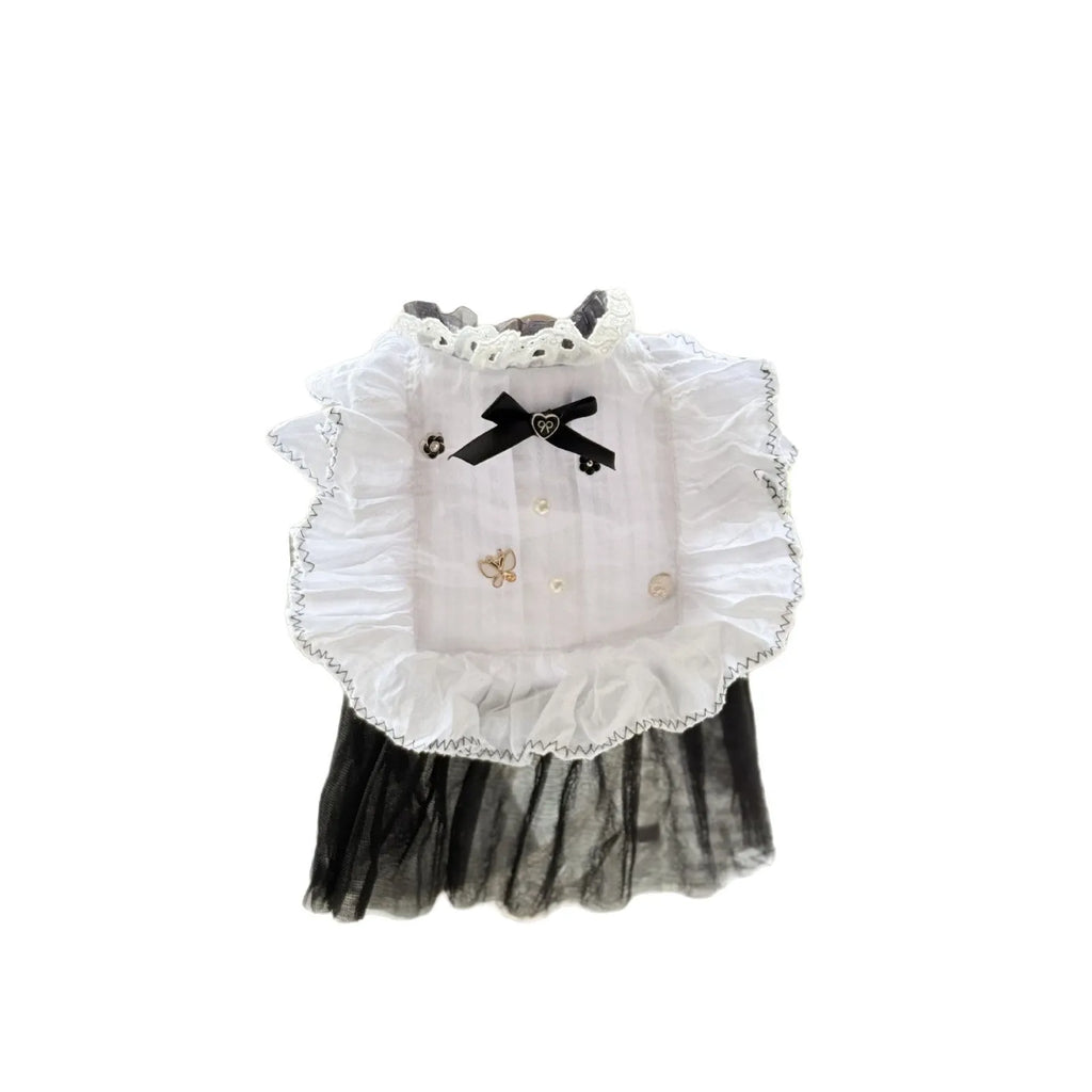 White polyester waltz gauze skirt costume on a small dog, showing princess style and lightweight fabric.