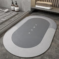 Blended fabric bathroom floor mat in oval and rectangular shapes on a tiled floor