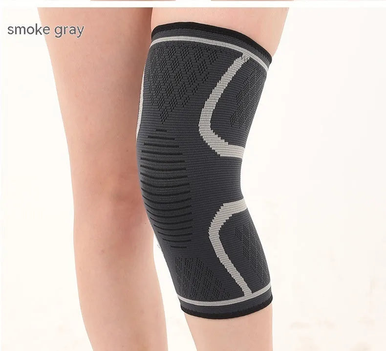 Double corrugated non-slip sports knee pads in various colours on a grey background.