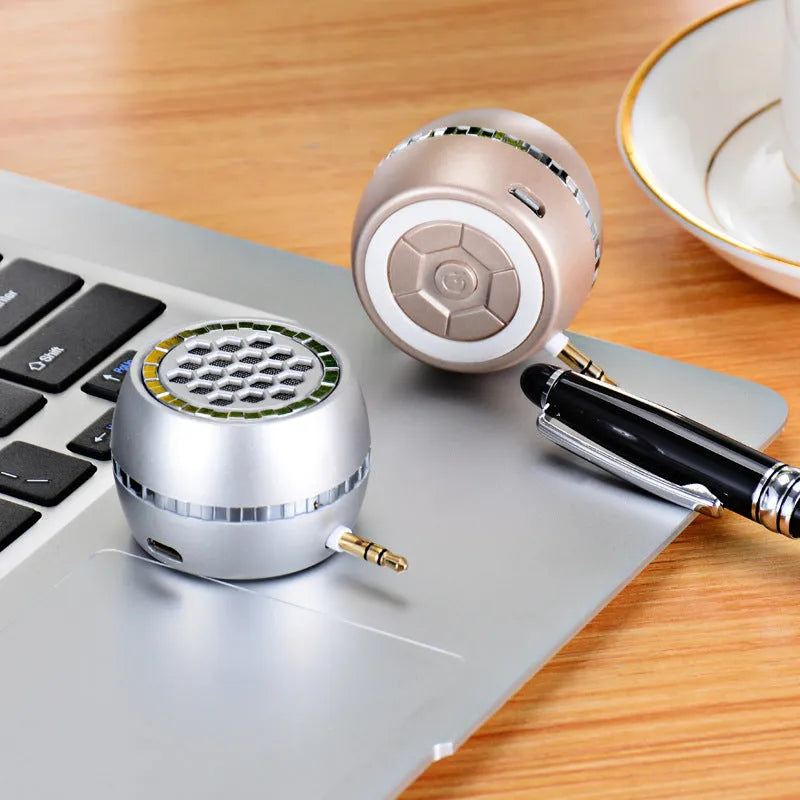 Universal external amplifier speaker in black, gold, and rose gold colours with 5V power input