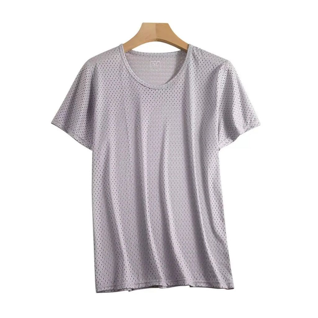Man wearing a loose-fit grey Ice Silk short sleeve crew neck T-shirt.