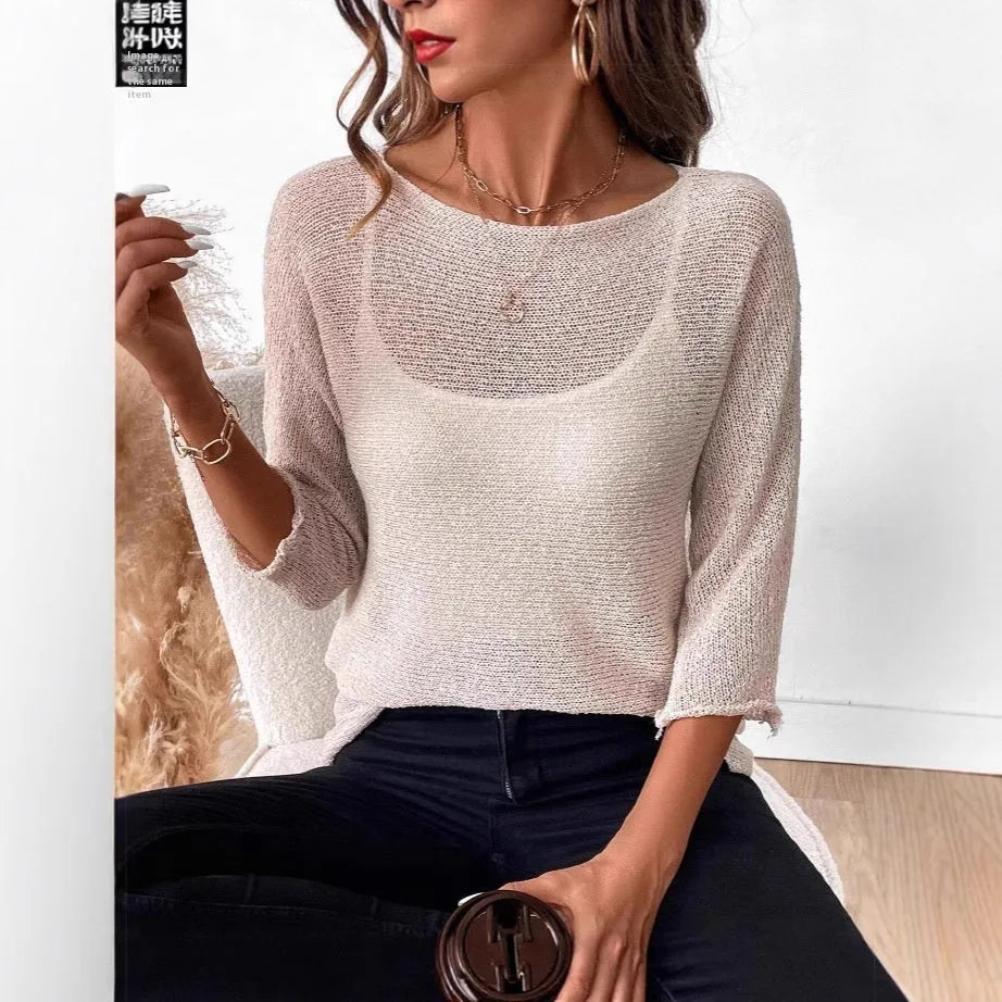 Women's knitted off-shoulder overall jumper in lavender purple with a 3D pattern and 3/4 sleeves.