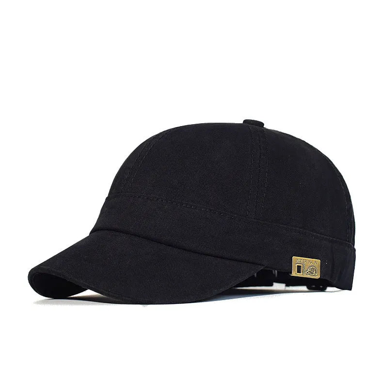Unstructured cotton dad hat in khaki with short 5.5 cm brim and adjustable strap, front view