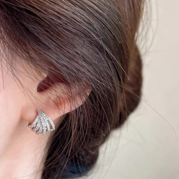 Women's platinum electroplated geometric earrings with line design and zircon details