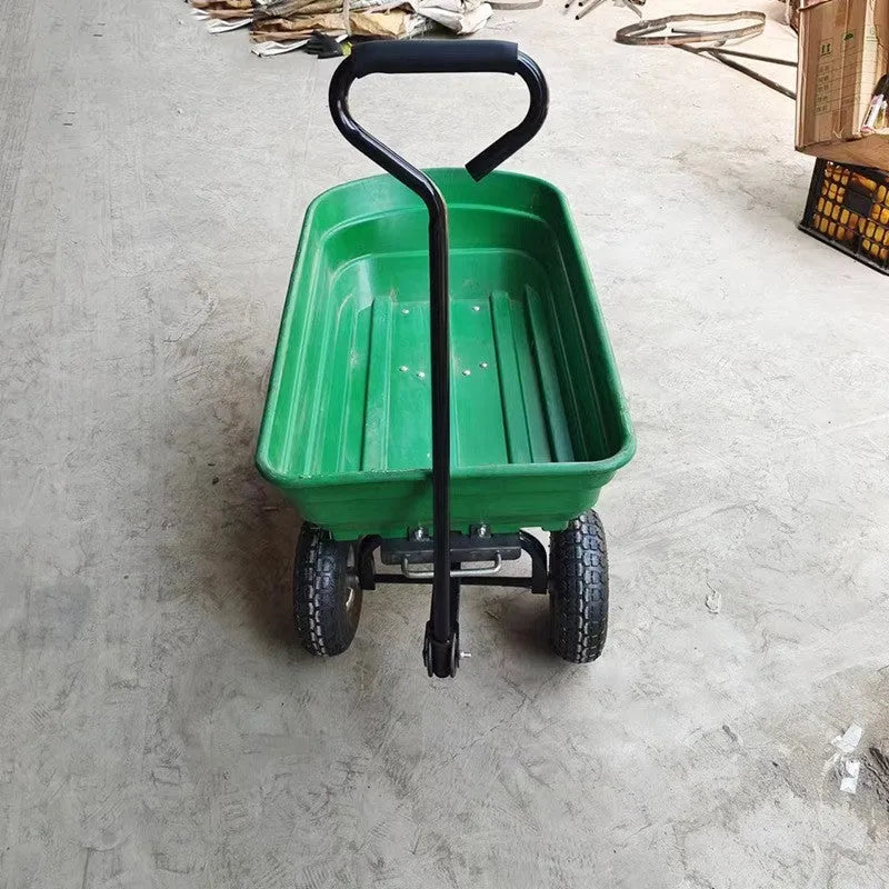 Green four-wheel plastic dumptruck for garden and agricultural use, model TC2145.