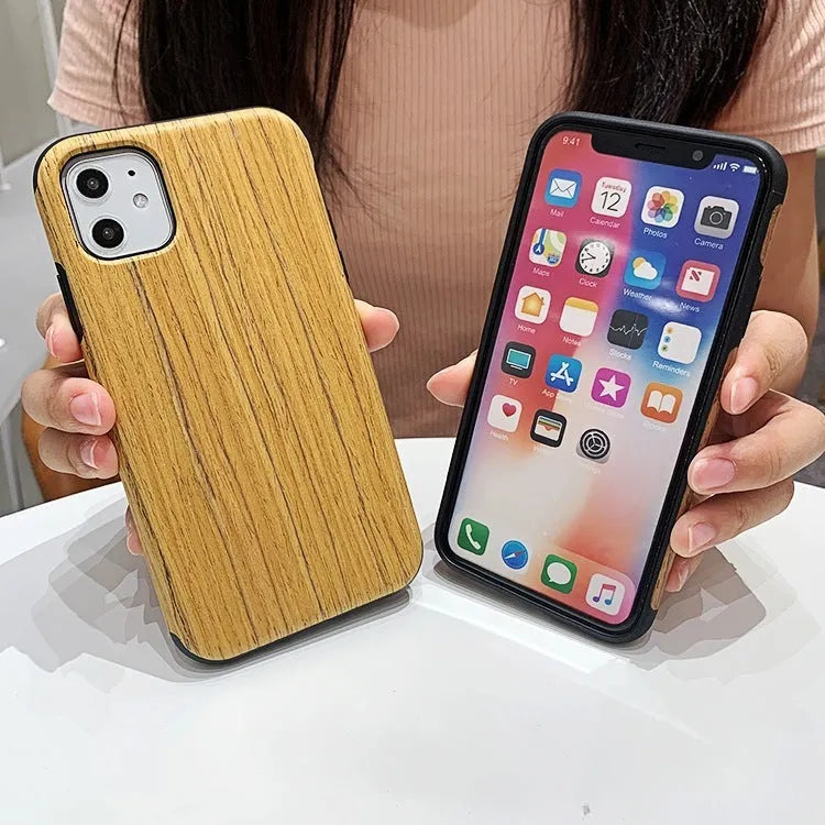 Wooden iPhone case with natural wood grain showing rosewood finish on iPhone 11 Pro