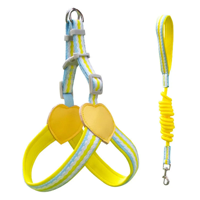 Nylon dog walking chest strap vest with an attached hand holding rope, shown in emerald green.