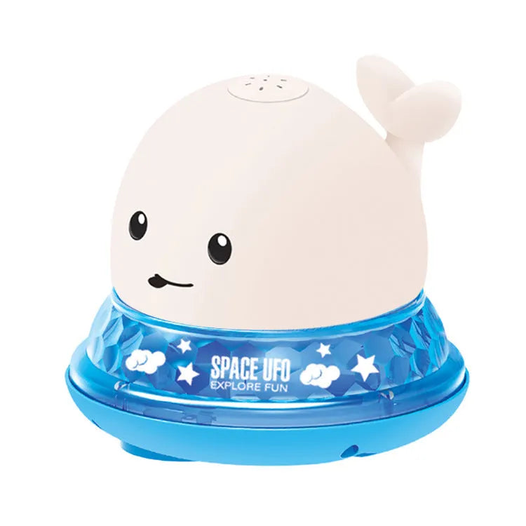 Automatic water spray whale bath toy floating in water with fountain and LED lights