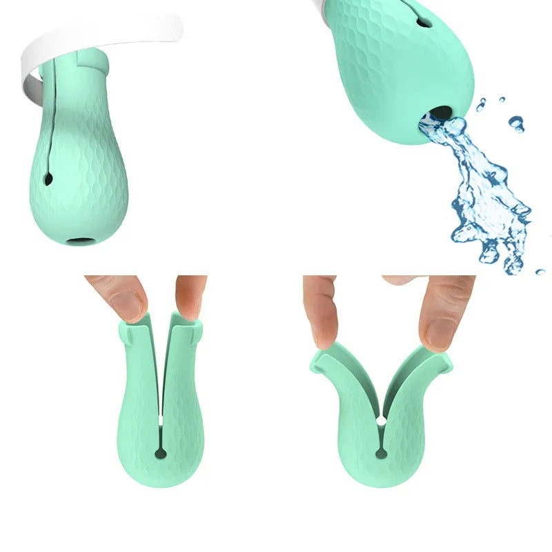 Four green silicone cat anti-scratch foot cover gloves for hand protection during washing and feeding