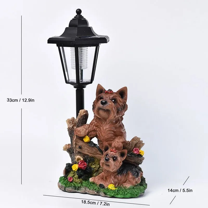 Solar hexagonal garden lamp with decorative resin figurine on plastic base for outdoor pathway lighting