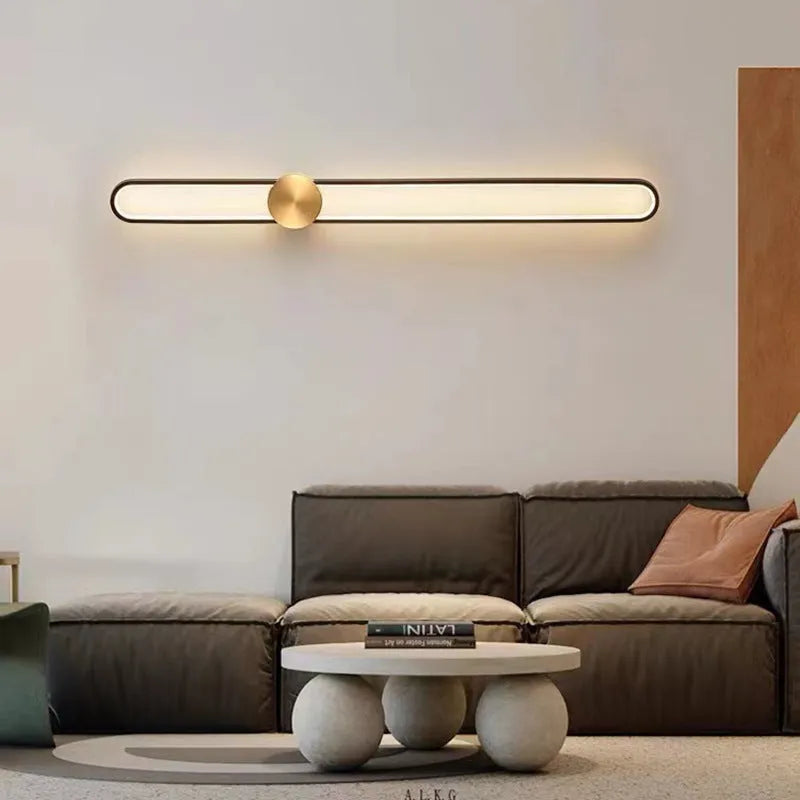 Modern minimalist wall lamp with iron shade and LED light in black or gold frame finish