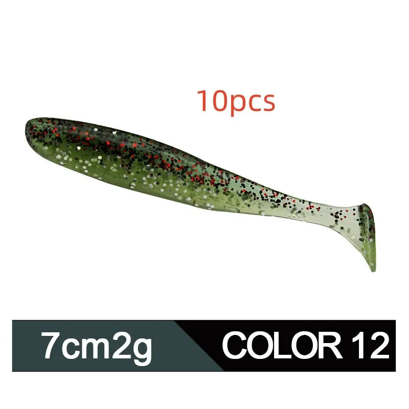Soft plastic T-tail fishing lure in two-tone mandarin fish pattern, 7cm long.