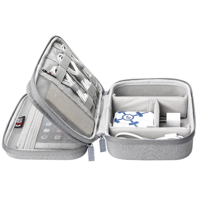 Black EVA digital storage bag with open compartment showing cable organisation