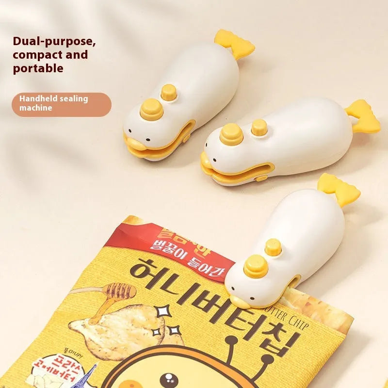 Yellow rechargeable handheld sealing machine with small duck design on animal jacquard casing.