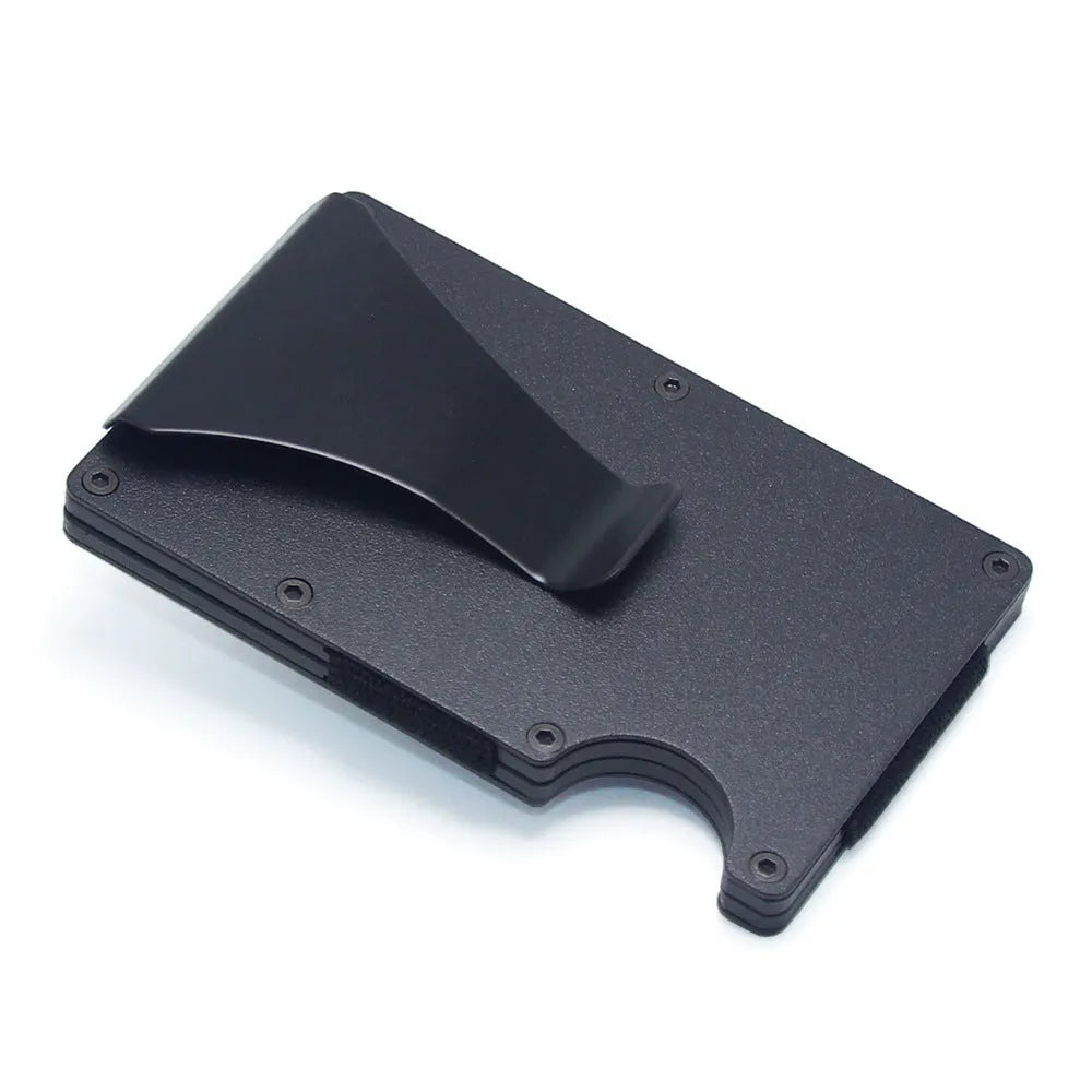 Geometric aluminium and carbon fibre card wallet for business cards and banknotes in a gift box.