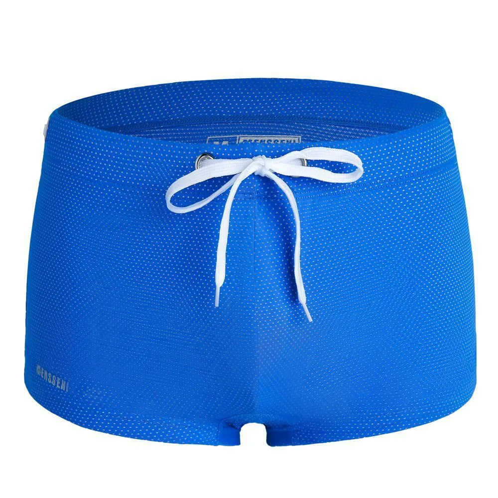 Men's low waist boxer style nylon swimming trunks in multiple solid colours