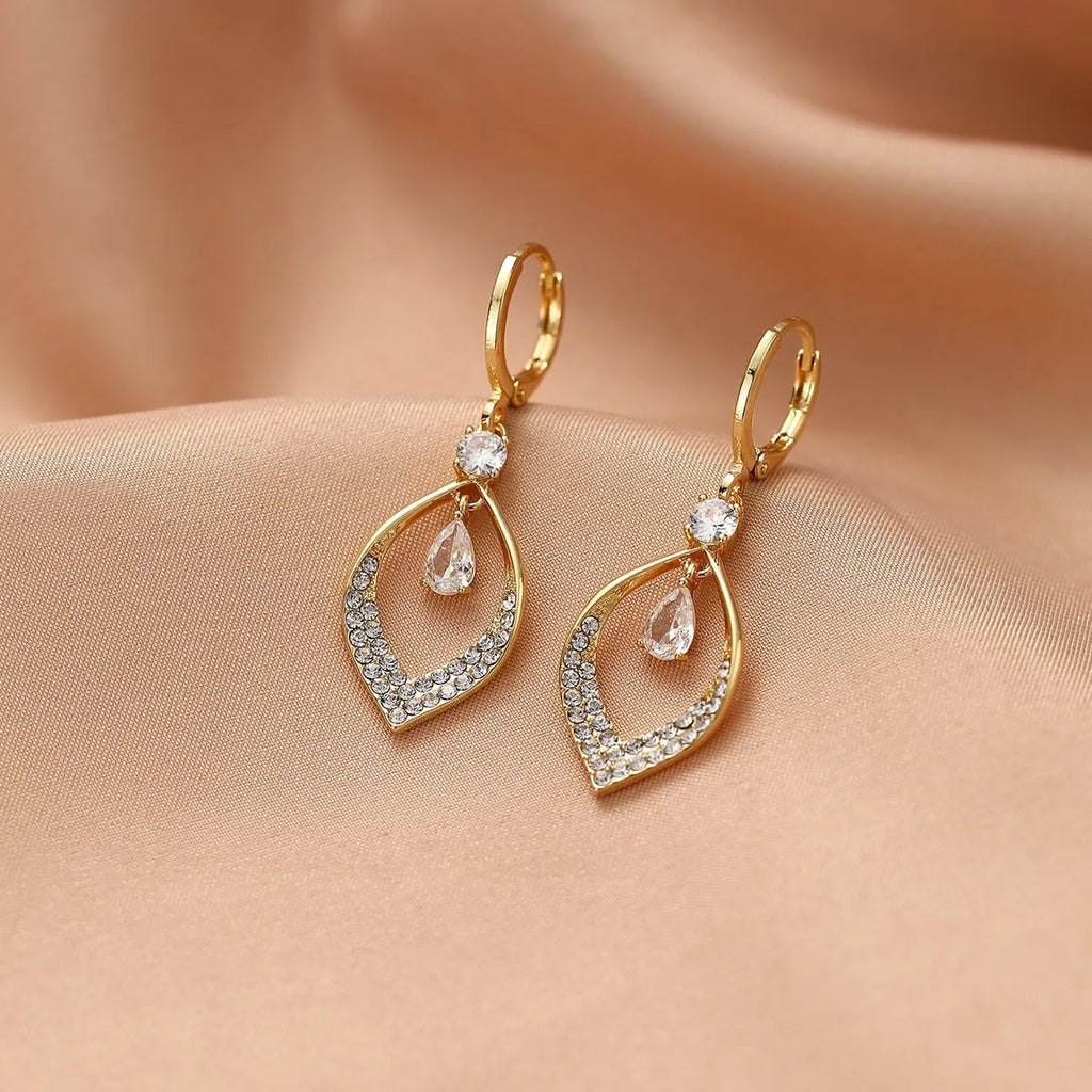 Women's gold and silver water drop tassel earrings with zircon detailing on thickened ear buckles