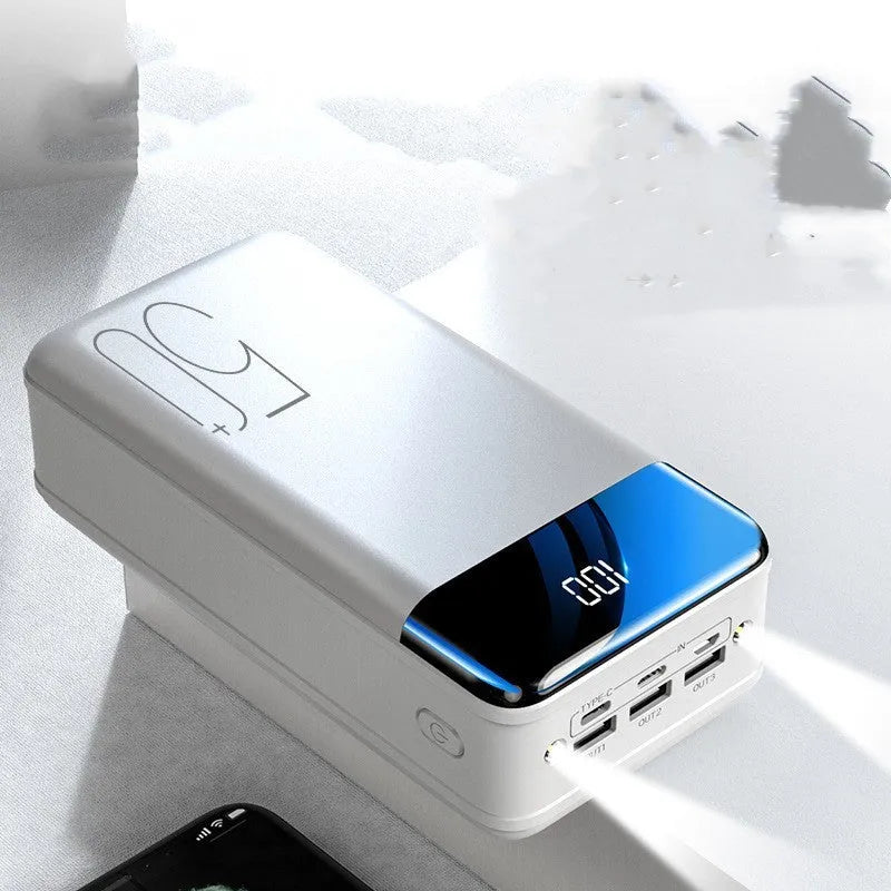 Large 50000mAh capacity power bank with three output ports in black or white plastic casing