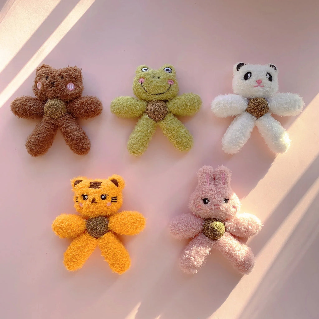 Edible catnip ball chewing toy for cats with plush animal design for dental enrichment