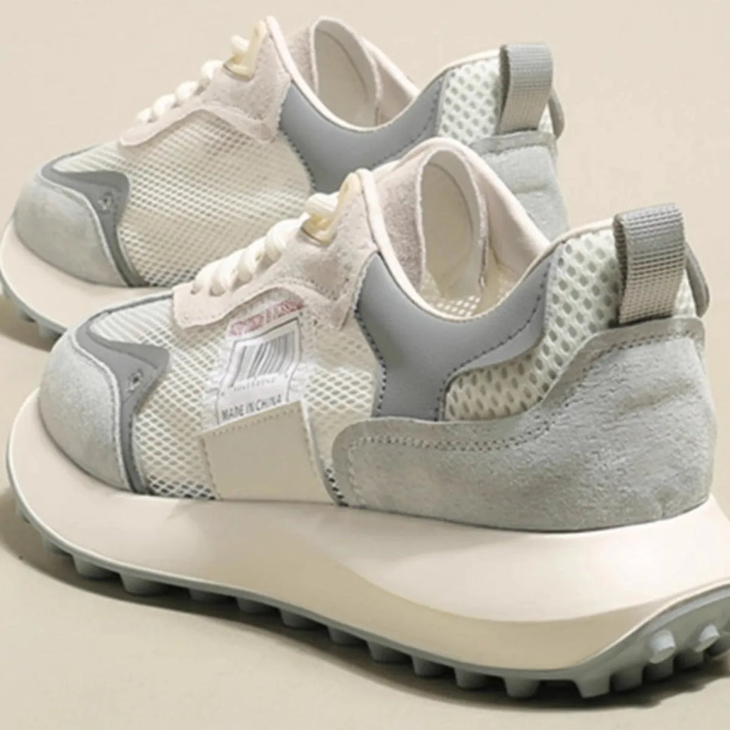 Women's grey and pink retro sneakers with mesh lining and rubber sole in low-top design