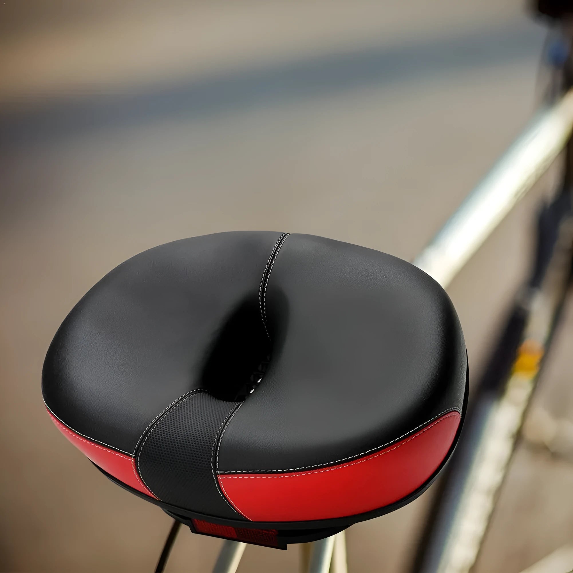 Plus-size thickened bicycle saddle with shock absorber in red, grey or light brown colours