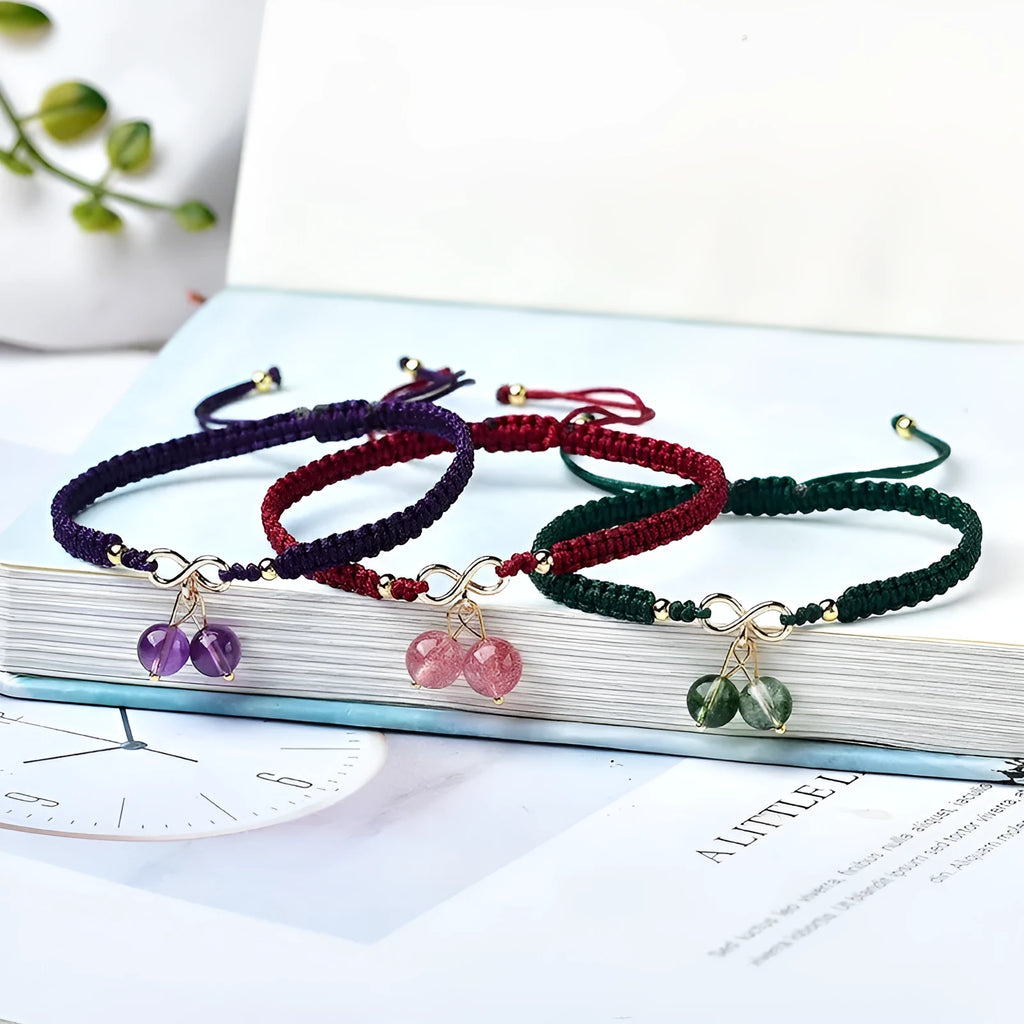 Women's crystal cherry bracelet with adjustable length in natural strawberry quartz colour
