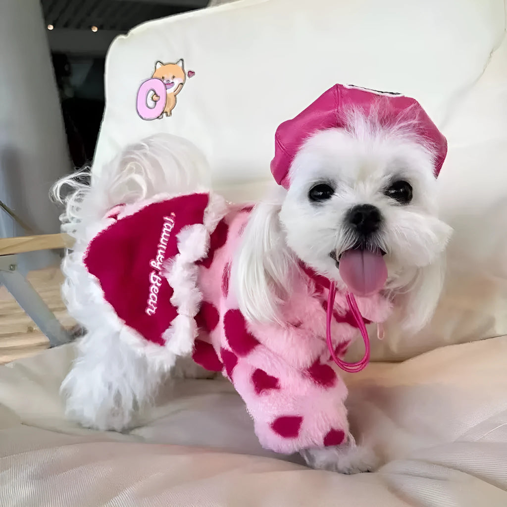 Pink plush warm coat for small dog on white background showing British style design