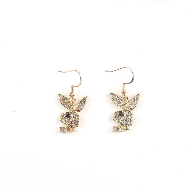 Cute rabbit-shaped stud earrings in silver, pink, or gold colour on a white background.
