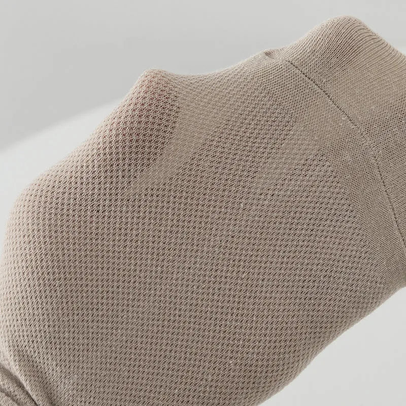 Men's solid colour low-cut polyester boat socks laid flat, showing ankle height and simple design.