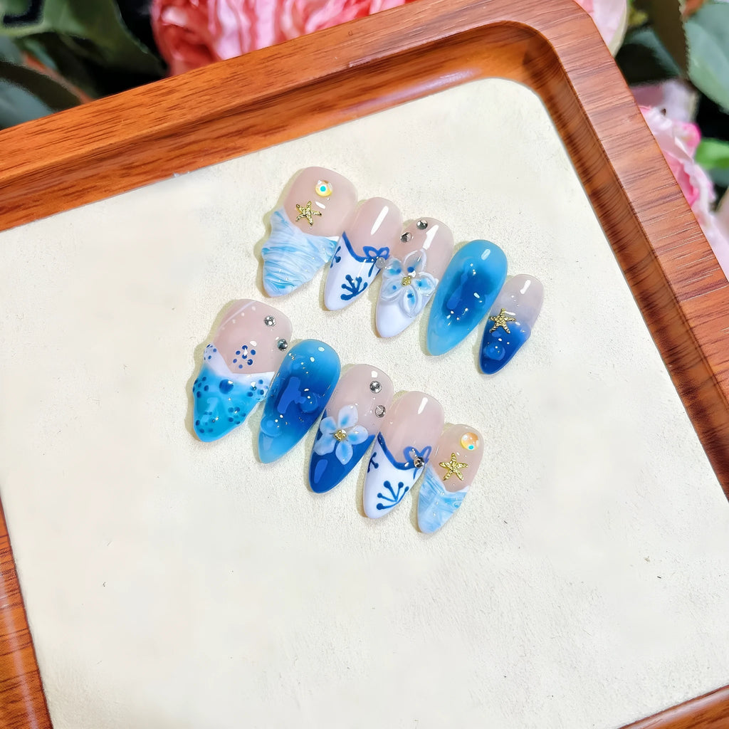 Blue hand-painted carved summer ice transparent fake nails set in plastic