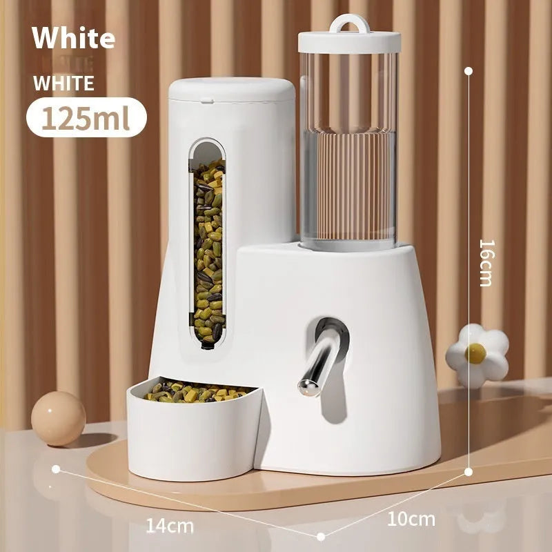 White, blue, and pink hamster automatic water feeder and food basin set on a white background.