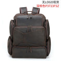 Dark brown retro crazy horse leather men's backpack open to show 17-inch laptop compartment and internal pockets.