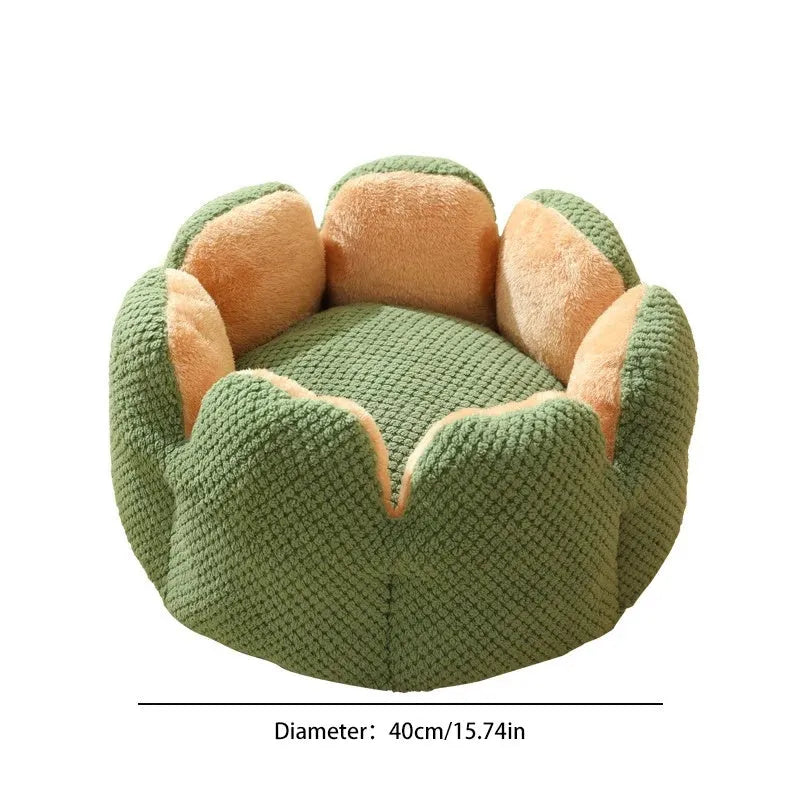 Green cactus petal shape plush kennel bed for cats and small dogs on a hardwood floor.