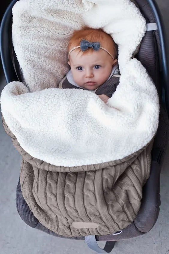 Envelope-style baby stroller sleeping bag with thick filling for winter, shown in a choice of colours.