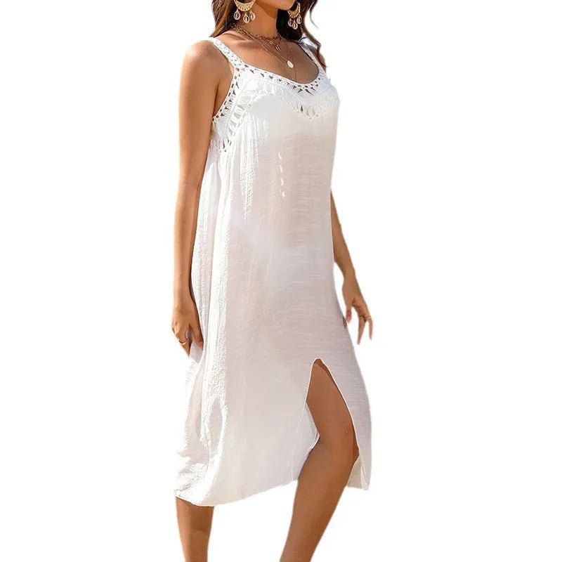 White women's crochet beach dress with suspender straps and side slits