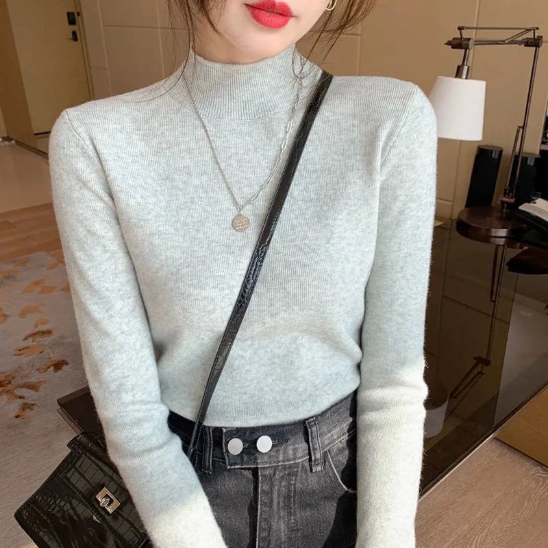 Slim fit long sleeve viscose bottoming shirt in apricot colour on a hanger